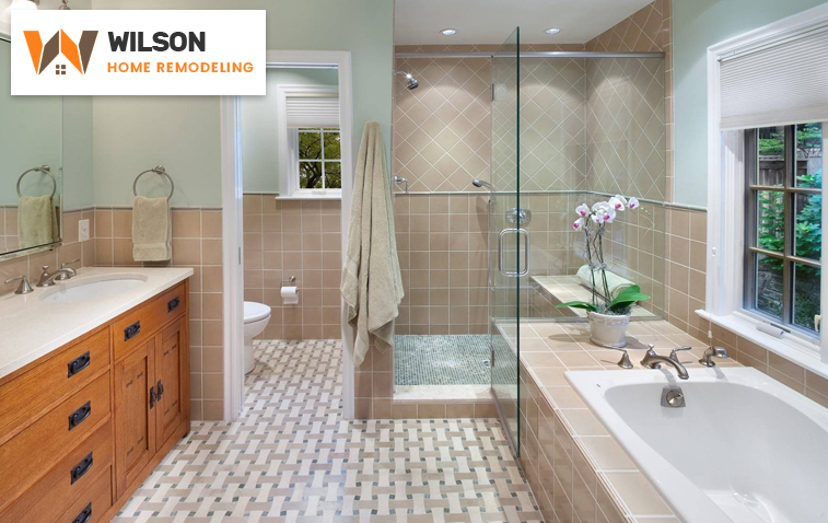 Bathroom with partition wall separating wet and dry zones